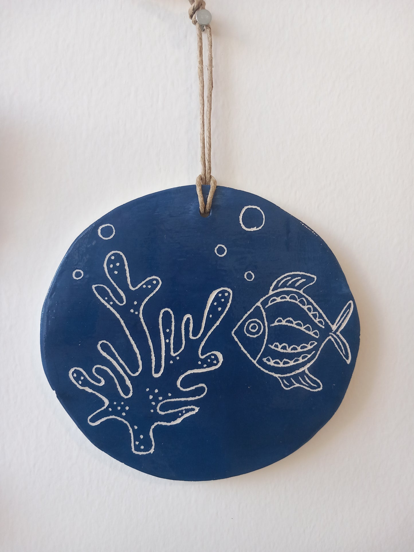 Piastrella decorativa pesce e corallo